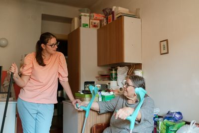 Caregiver engaging with a senior at home
