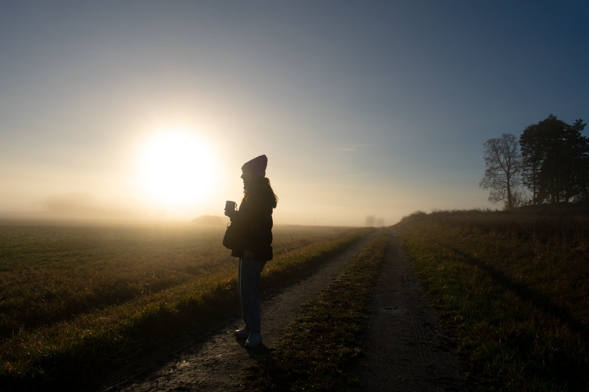 Person considering different paths as a metaphor for finding purpose in life